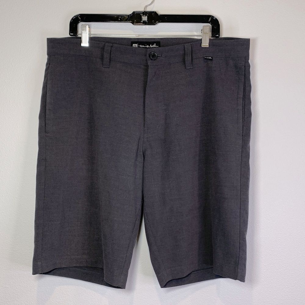 Travis Matthew shorts with flat front zip fly pockets—gray, designed for men.